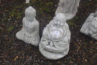 Two cast concrete garden statues in the form of Bu