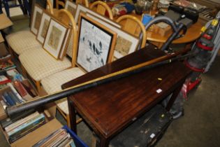 A vintage snooker cue in metal case