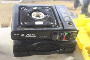 A Jinyu portable gas range in fitted plastic case