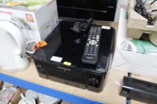 A Marantz M-CR610 CD receiver with remote control