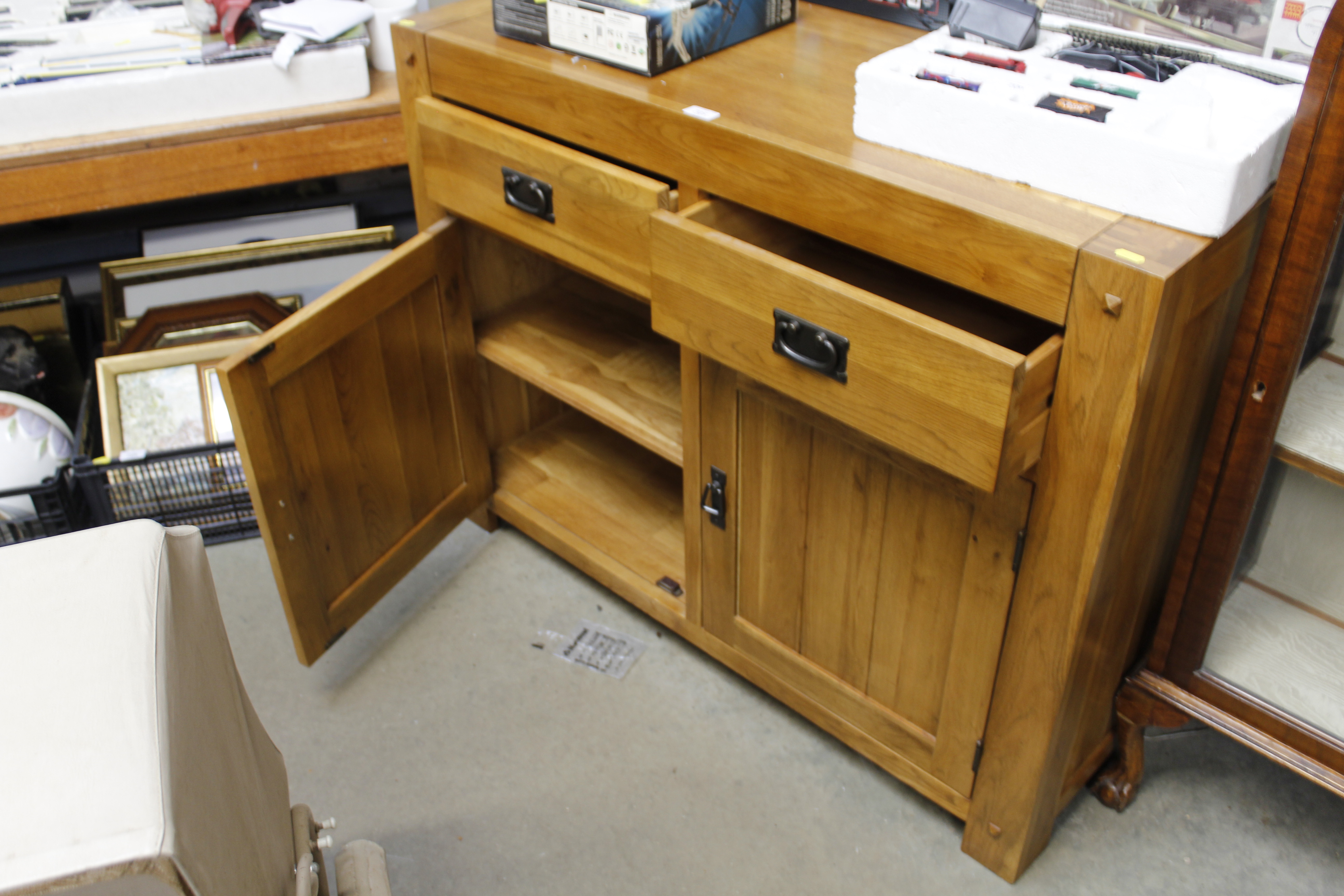 An oak sideboard fitted two short drawers over twin cupboard base - Image 2 of 2