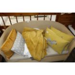 A quantity of various pillows, cushions, blankets