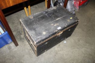 A wooden twin handled trunk
