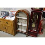 An Art Deco style walnut display cabinet