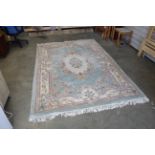 An approx. 9'8" x 6'3" floral patterned rug