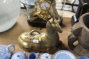 A large brass pot and cover in the form of a stag