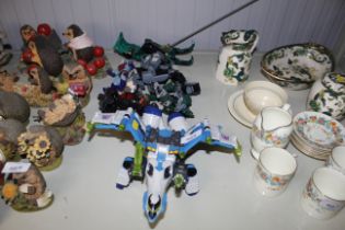 A quantity of various toys to include Transformers