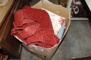 A box containing various curtains to include Dunel