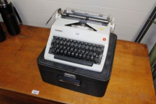 An Olympia typewriter in case