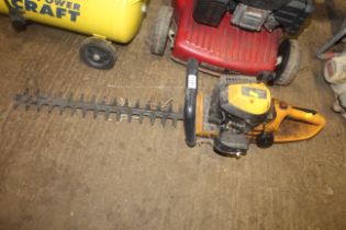 A JCB PHT24 petrol hedge trimmer