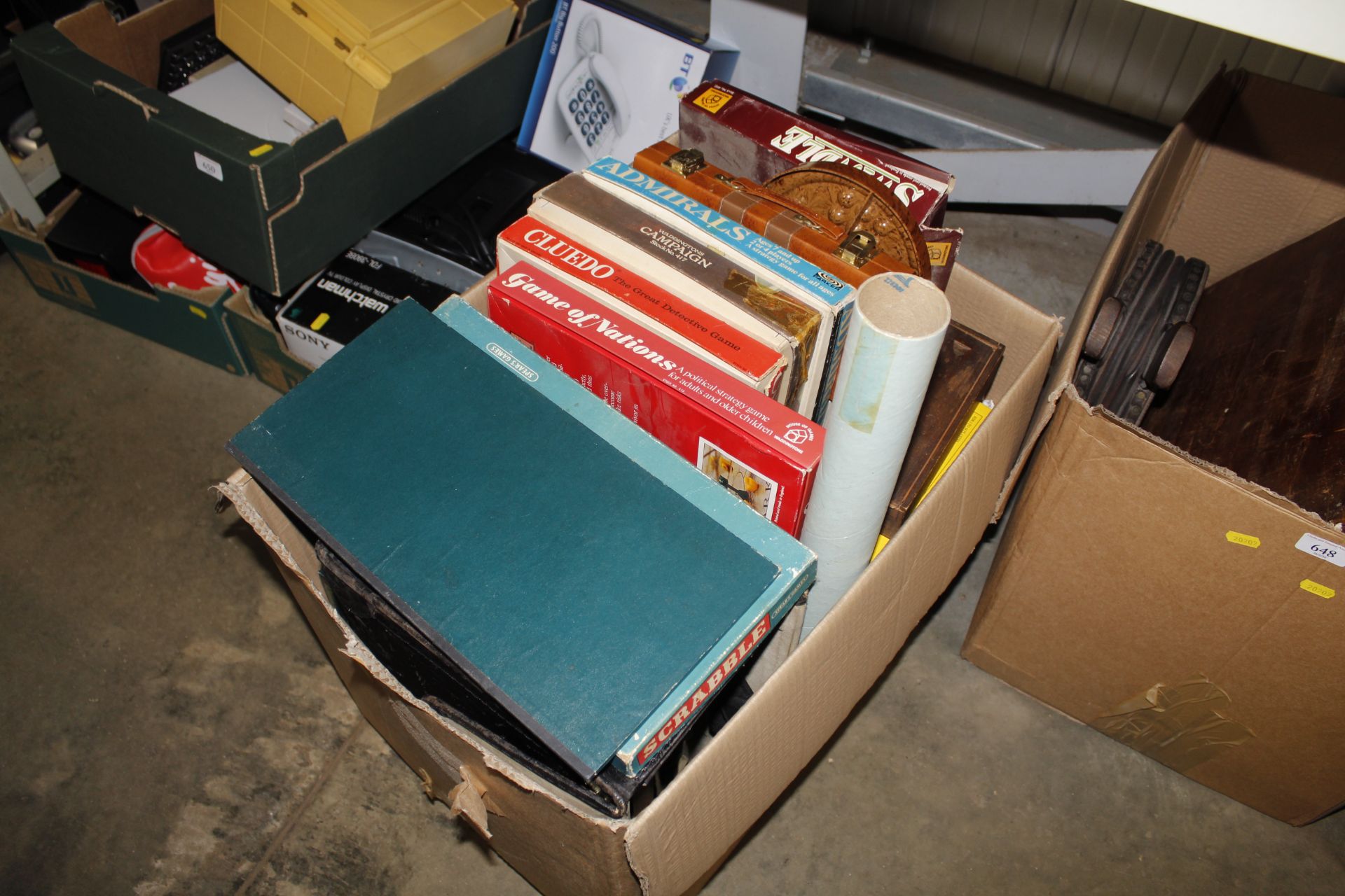 A box containing various board games