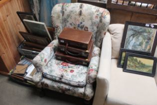 A floral upholstered wing back armchair