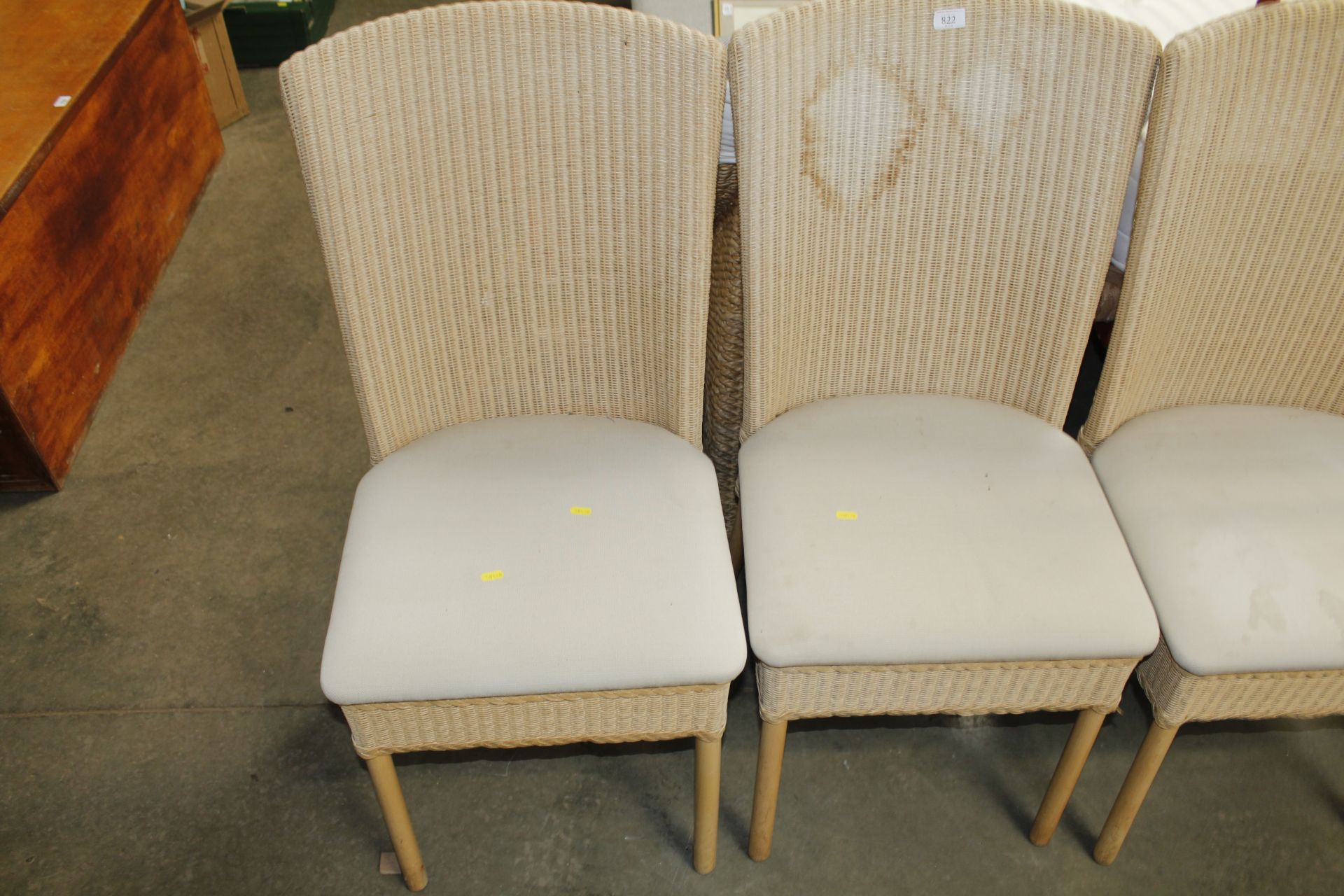 A set of four Lloyd Loom dining room chairs (some stained) - Image 2 of 4