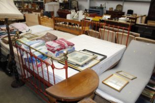 A painted iron and brass double bed frame with Joh