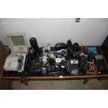 A large quantity of various camera equipment including a Nikkormat camera in fitted leather case,