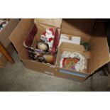 A box containing various Christmas decorations