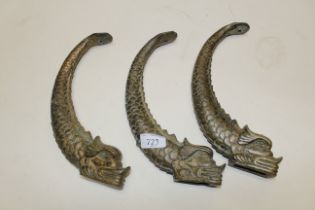Three brass Oriental style dragon brackets