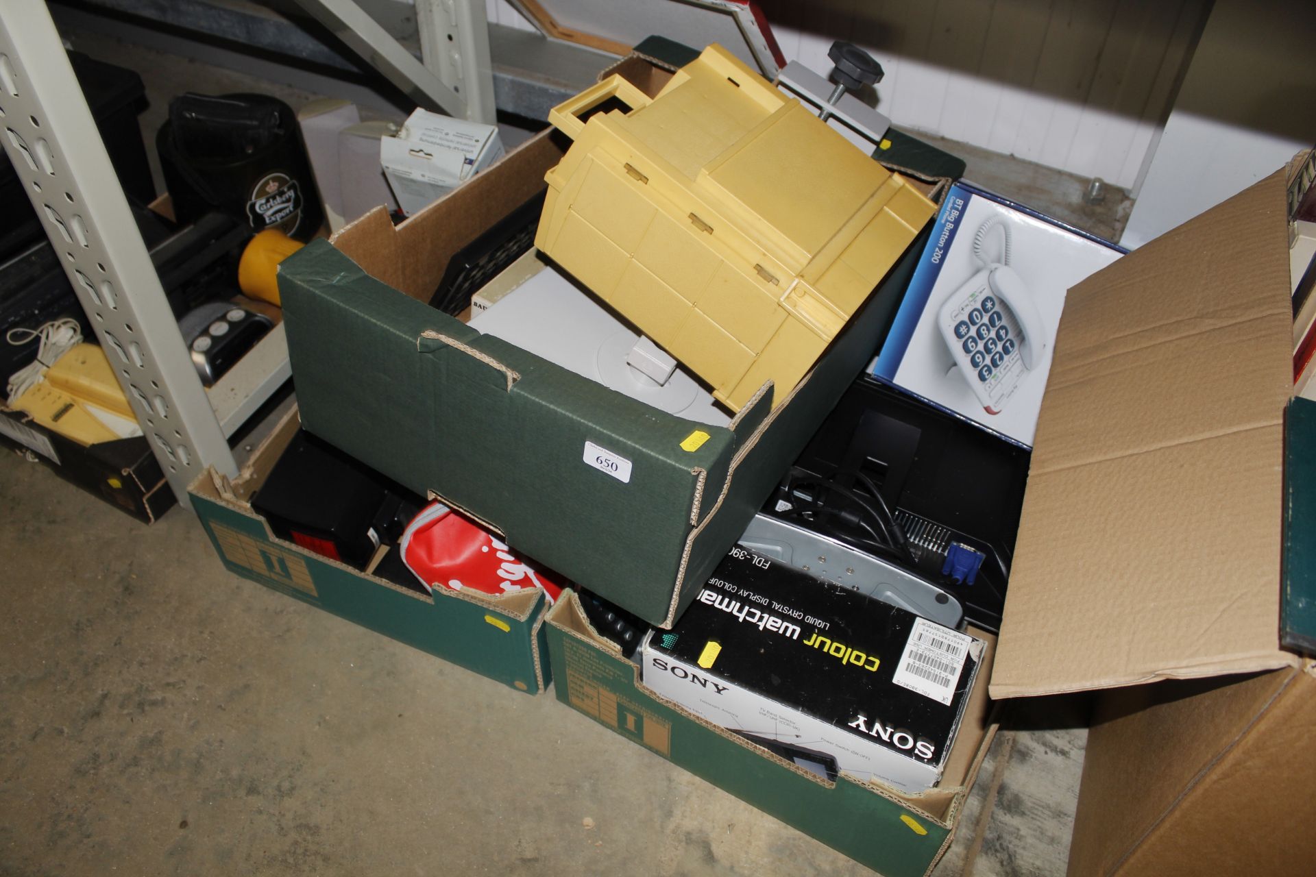 Three boxes of various items to include a BT Home