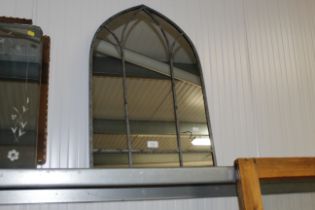 A small gothic style mirror (125)