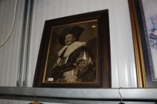 An oak framed print of a laughing cavalier