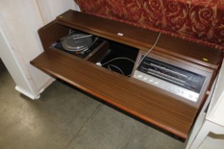 A Ferguson stereo cabinet comprising a radio tuner