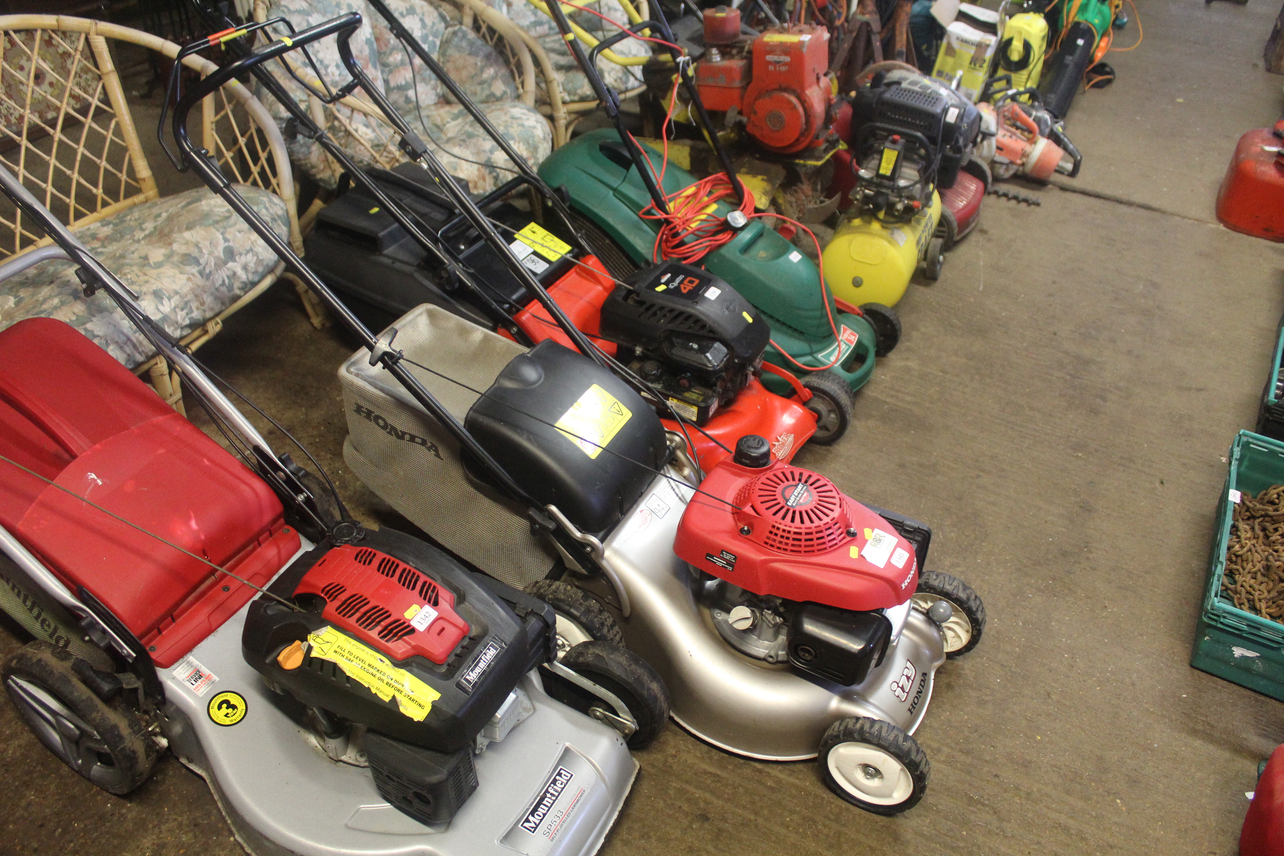 A Honda Izy self-propelled rotary lawn mower with