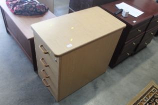 A modern four drawer filing pedestal chest