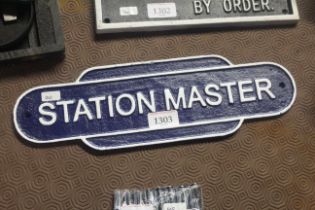 A painted cast iron sign for "Station Master" (201