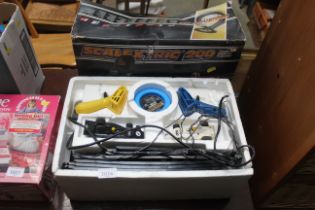 A Scalextric 200 electric model racing game with o
