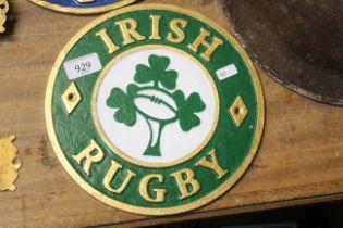 A painted circular cast iron sign for 'Irish Rugby