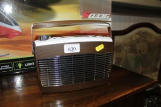 A John Lewis Aston DAB radio in walnut finish lacking charger