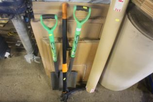 A border spade, a digging spade, and a Fiskars W52