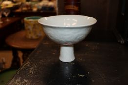 A Chinese porcelain stem cup