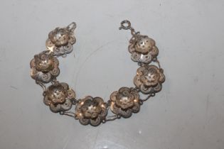 A silver filigree bracelet