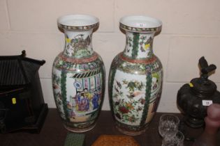 A pair of Canton baluster vases decorated in the t