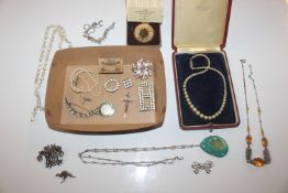 A box of costume jewellery; various paste set jewe
