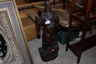 A Chinese hardwood carved figure