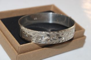 A 1977 Birmingham solid Sterling silver bangle, ap