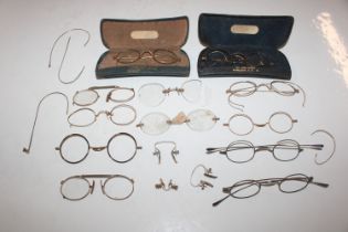 A collection of gold and gold plated spectacles