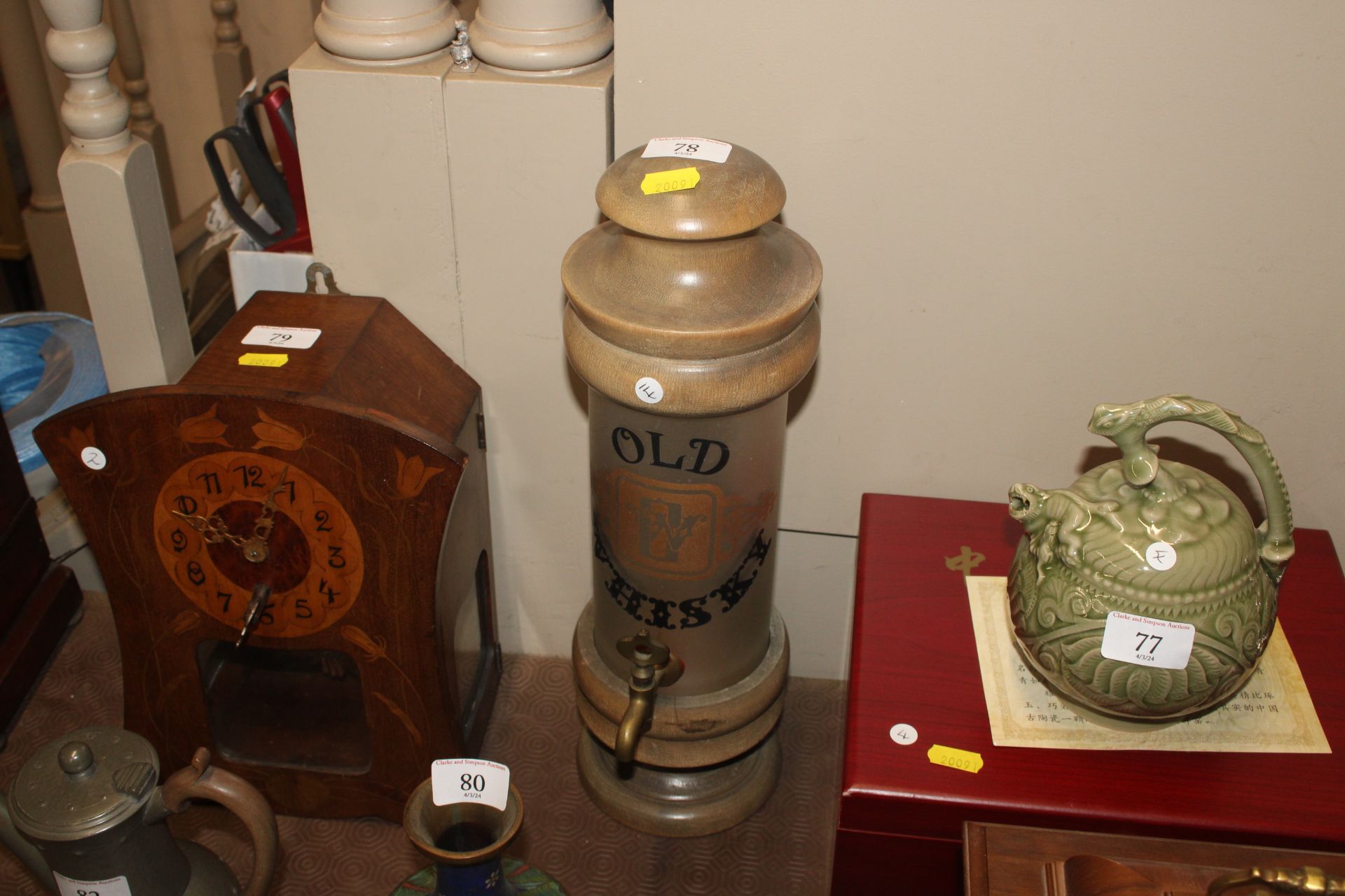 An old Whisky advertising dispenser with brass tap