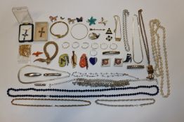 A box of various costume jewellery