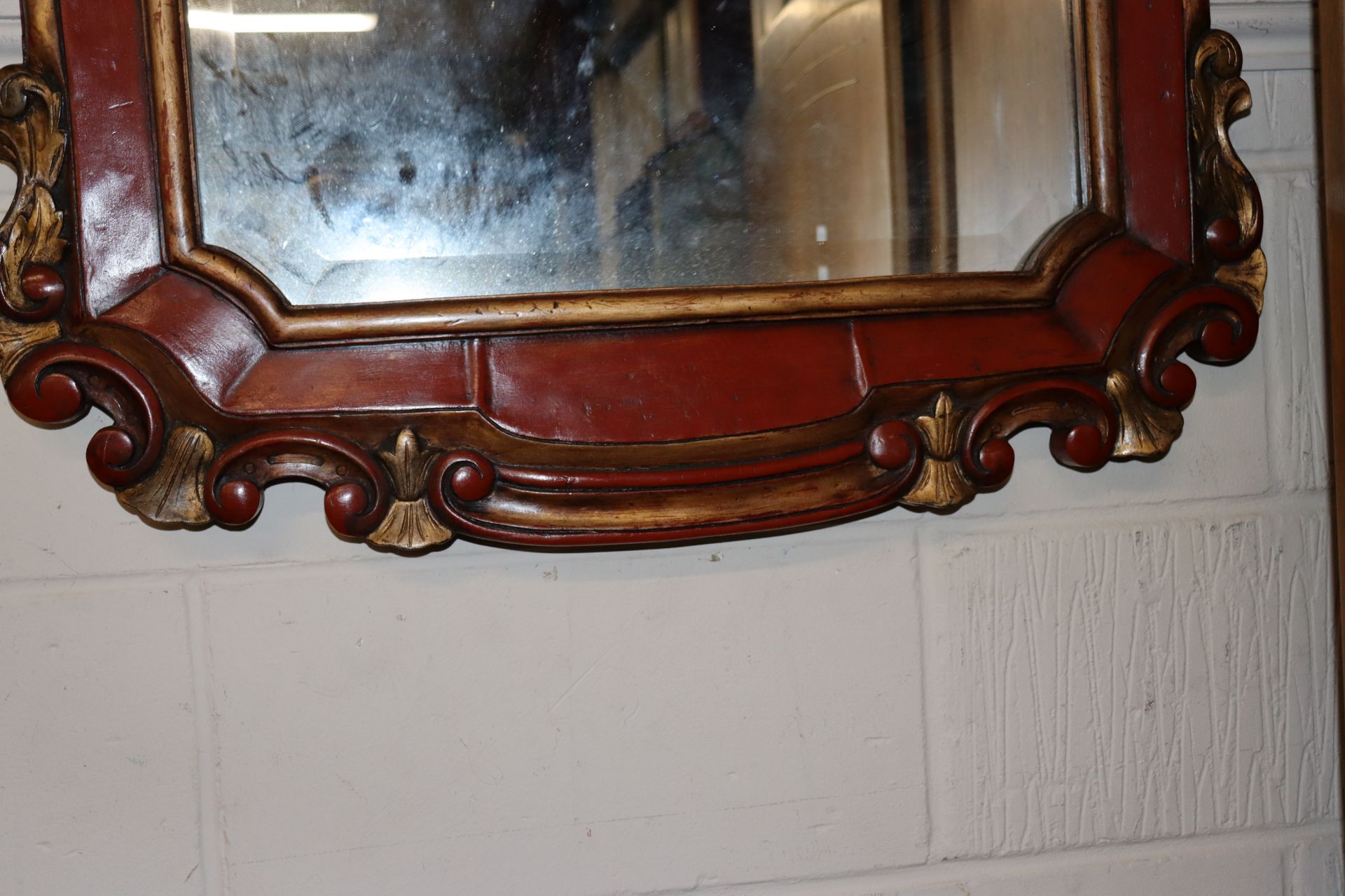 A red painted and gilt bevel edged wall mirror, me - Image 3 of 3