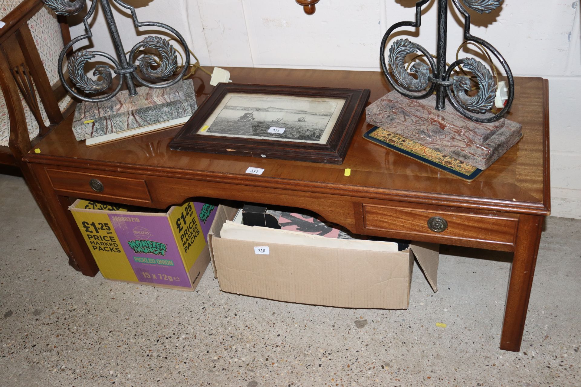 A mahogany and cross banded coffee table fitted tw