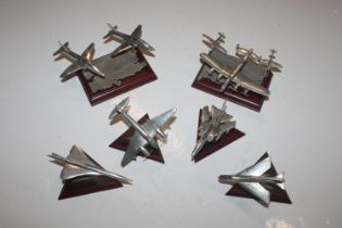 A collection of pewter and Royal Hampshire models