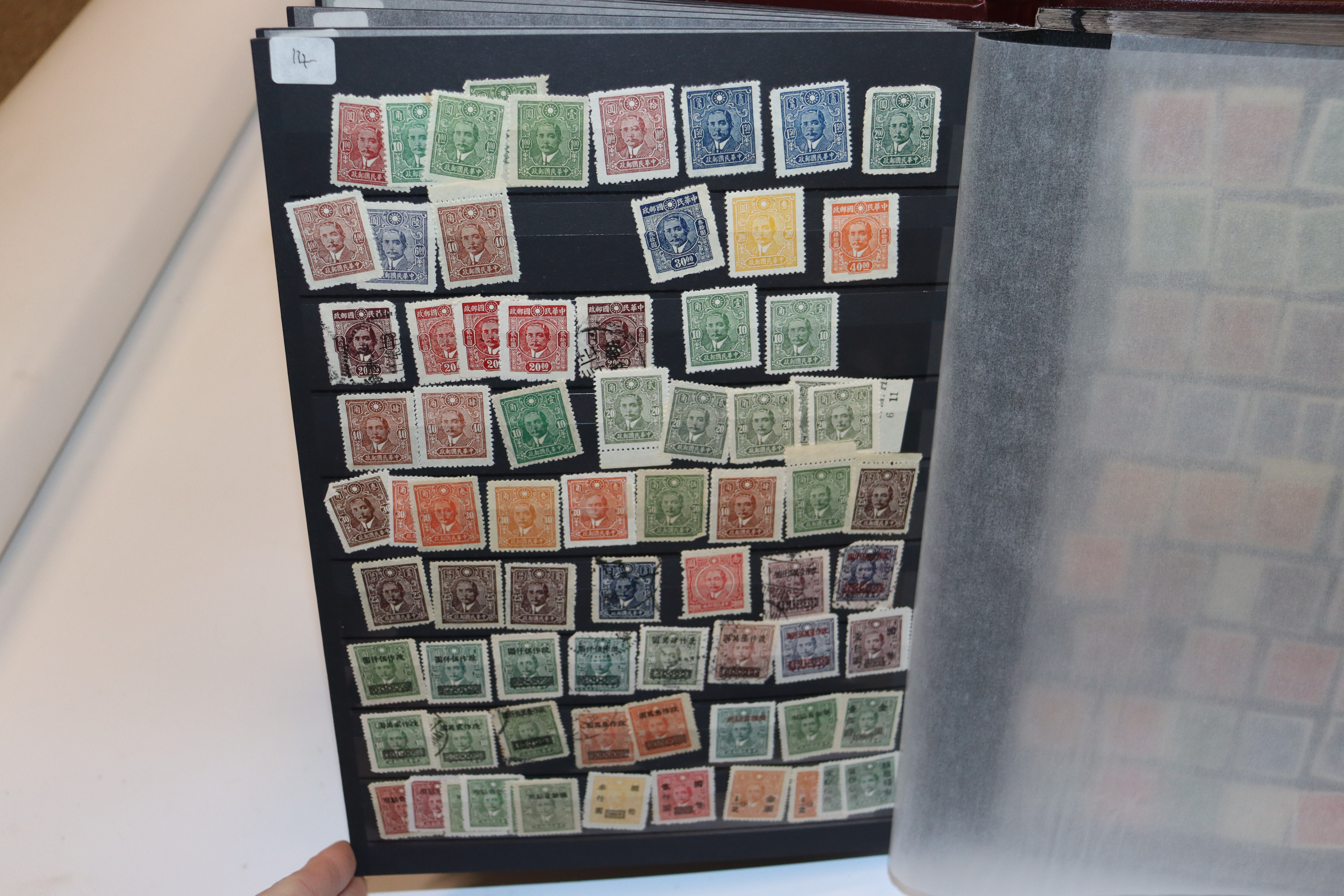 A Chinese stock book of stamps, mainly pre WWII in - Image 15 of 47