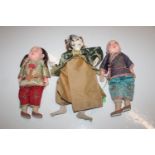 Two Oriental dolls and similar puppet