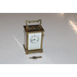 A brass cased carriage clock