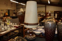 A German pottery table lamp and shade