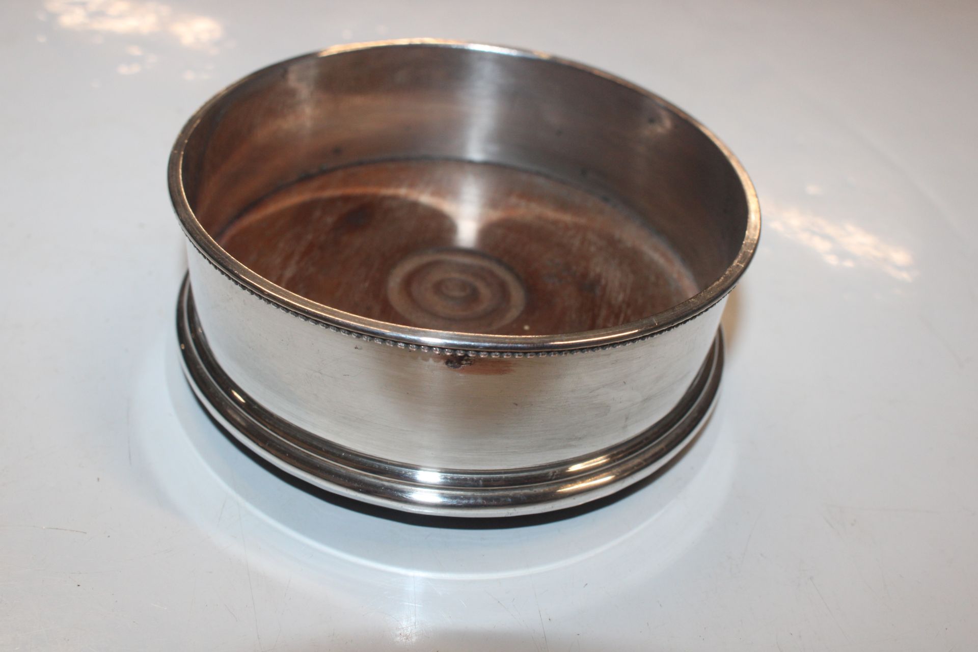 A circular silver dish raised on three supports, a - Image 6 of 6
