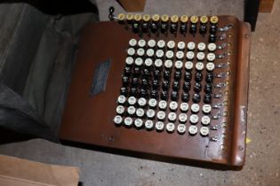 A Comptometer copper early desk calculator